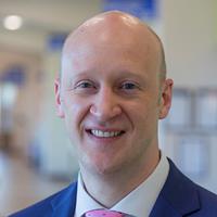 Headshot of Joseph S. Redman, MD, PhD
